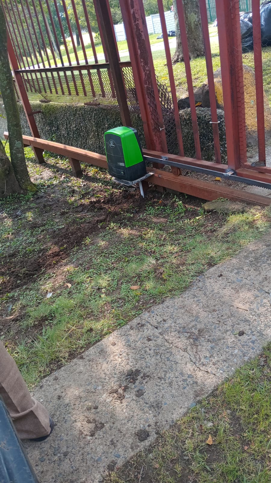 Centurion sliding gate motor on red gate