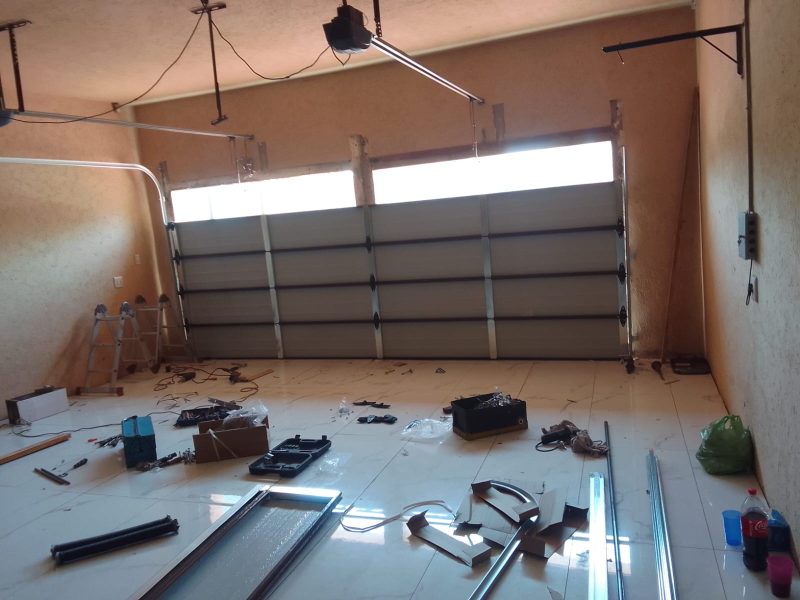 Garage door installation in progress